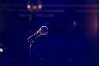 picture of a microphone with a purple background